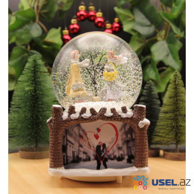 Musical snow globe with photo frame